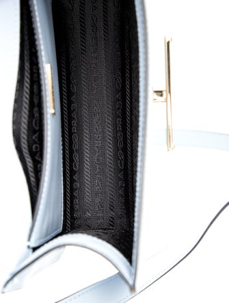 Prada Enameled Metal Triangle Emblème