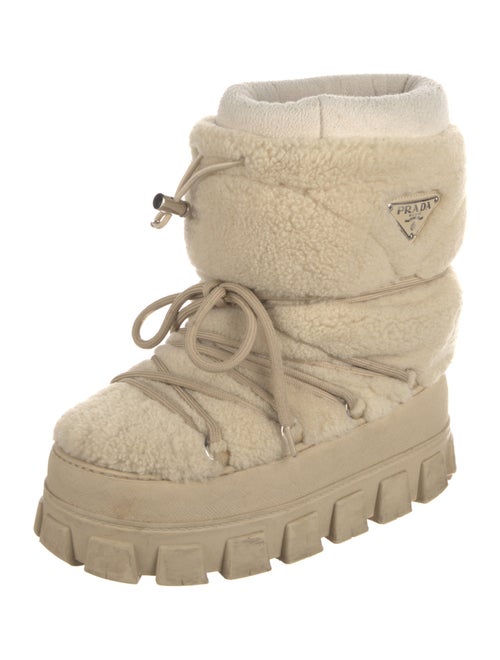 Prada Enameled Metal Triangle Shearling Lace-Up Boots