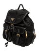 Prada Enameled Metal Triangle Backpack