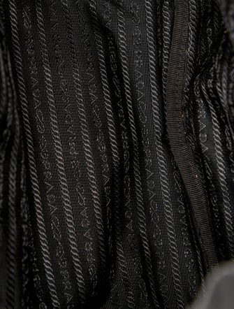 Prada Enameled Metal Triangle Backpack