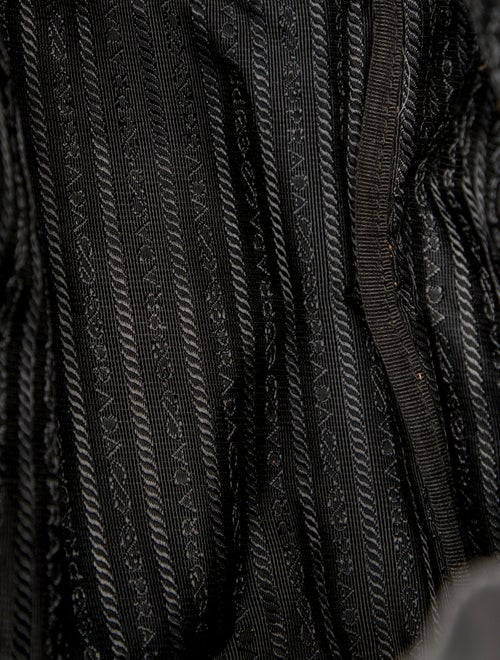 Prada Enameled Metal Triangle Backpack