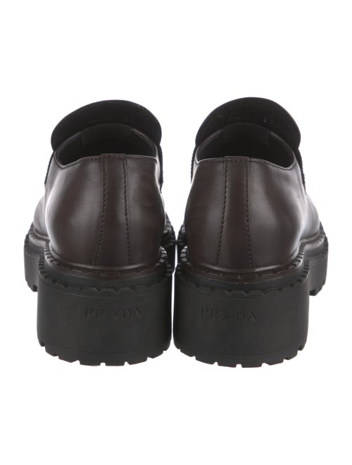 Prada Enameled Metal Triangle Leather Loafers
