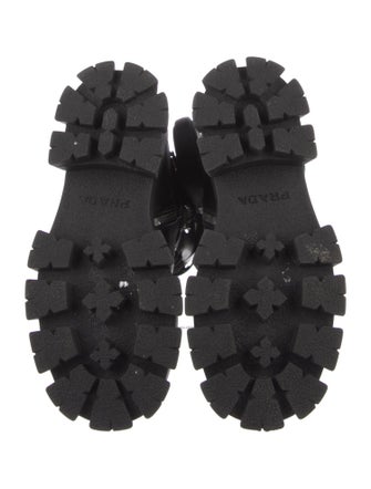 Prada Enameled Metal Triangle Leather Combat Boots