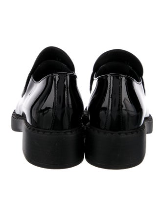 Prada Enameled Metal Triangle Patent Leather Pumps