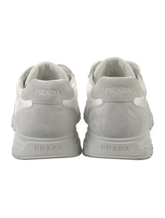 Prada Enameled Metal Triangle Nylon Sneakers
