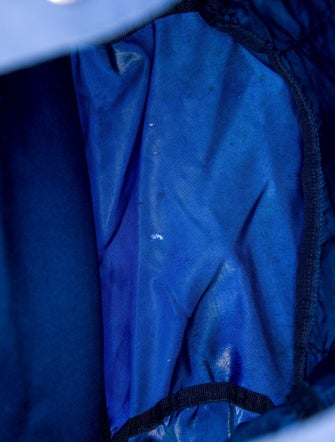 Prada Enameled Metal Triangle Backpack