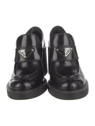 Prada Enameled Metal Triangle Patent Leather Pumps