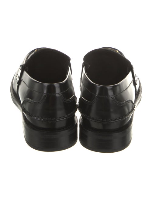 Prada Enameled Metal Triangle Patent Leather Loafers