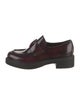 Prada Enameled Metal Triangle Patent Leather Oxfords