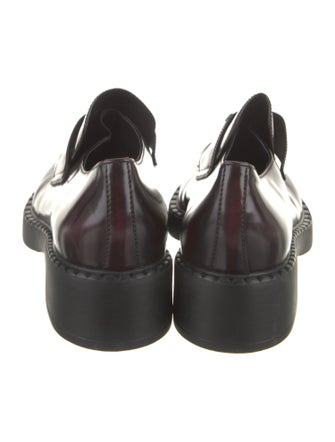 Prada Enameled Metal Triangle Patent Leather Oxfords