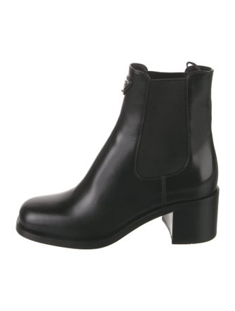 Prada Enameled Metal Triangle Leather Chelsea Boots