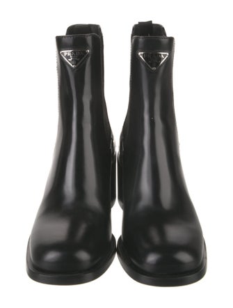 Prada Enameled Metal Triangle Leather Chelsea Boots