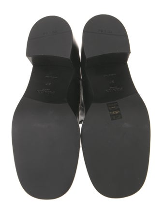 Prada Enameled Metal Triangle Leather Chelsea Boots