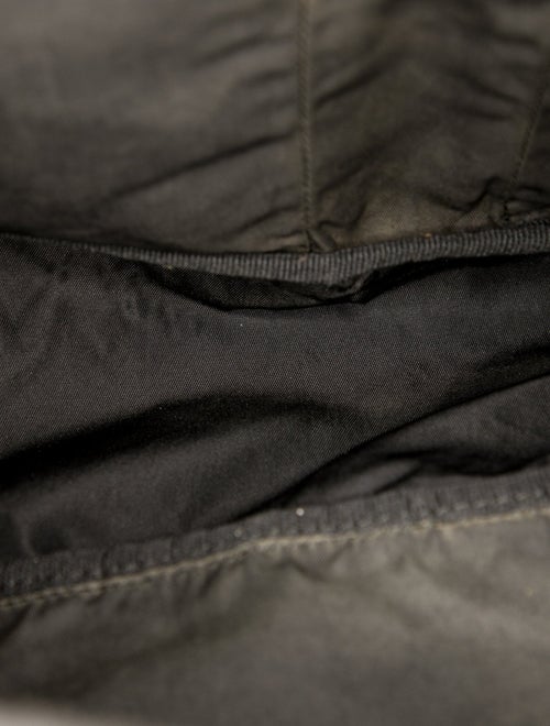 Prada Enameled Metal Triangle Backpack