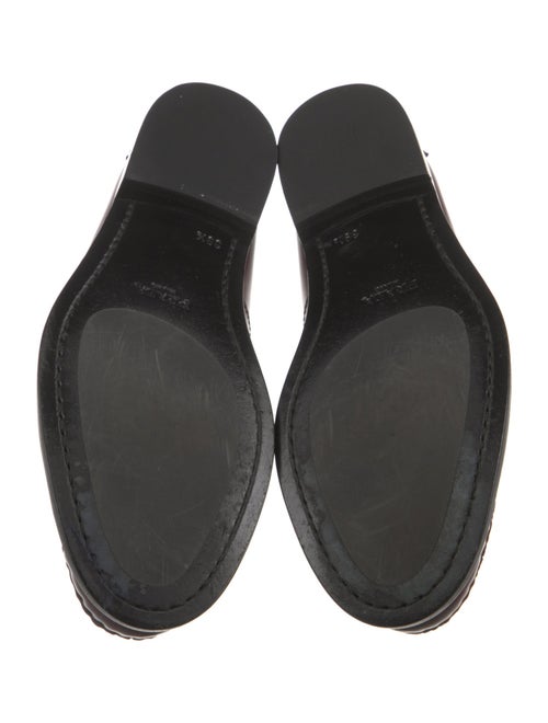 Prada Enameled Metal Triangle Patent Leather Loafers