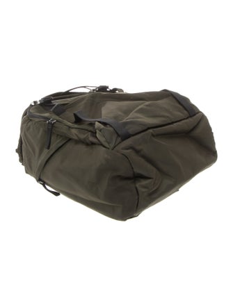 Prada Enameled Metal Triangle Backpack