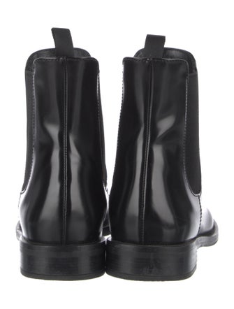 Prada Enameled Metal Triangle Leather Chelsea Boots