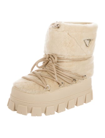 Prada Enameled Metal Triangle Shearling Lace-Up Boots