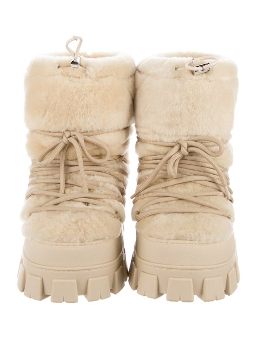 Prada Enameled Metal Triangle Shearling Lace-Up Boots