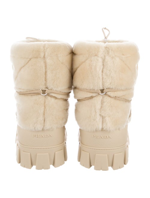 Prada Enameled Metal Triangle Shearling Lace-Up Boots
