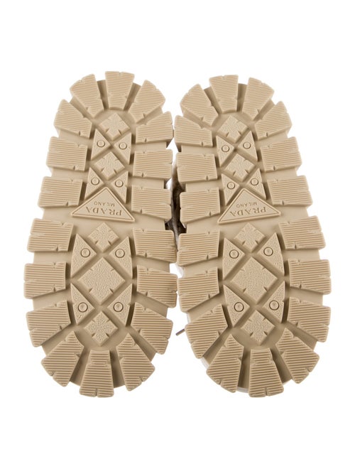 Prada Enameled Metal Triangle Shearling Lace-Up Boots