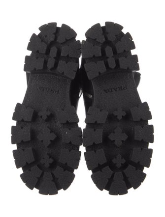 Prada Enameled Metal Triangle Leather Combat Boots