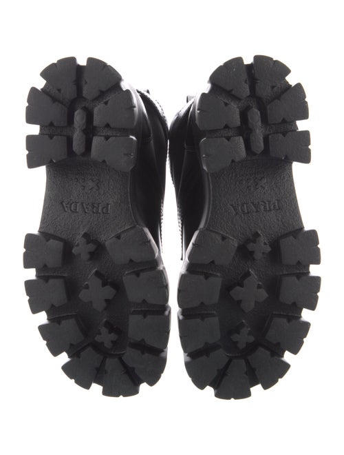 Prada Enameled Metal Triangle Leather Combat Boots