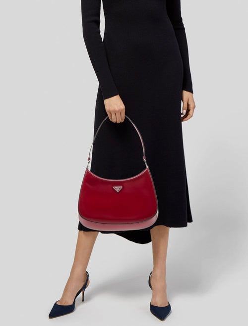 Prada Enameled Metal Triangle Cleo