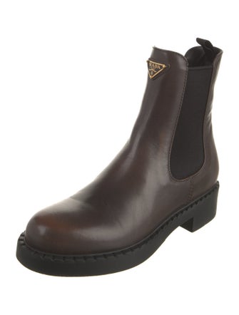 Prada Enameled Metal Triangle Leather Chelsea Boots