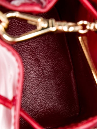 Prada Enameled Metal Triangle Bucket Bag