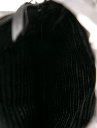 Prada Enameled Metal Triangle Backpack