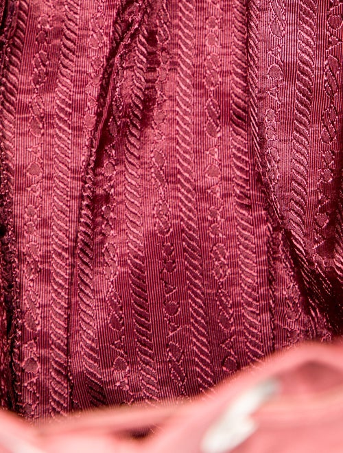 Prada Enameled Metal Triangle Backpack