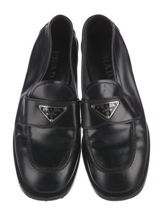 Prada Enameled Metal Triangle Patent Leather Loafers