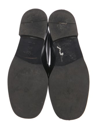 Prada Enameled Metal Triangle Patent Leather Loafers