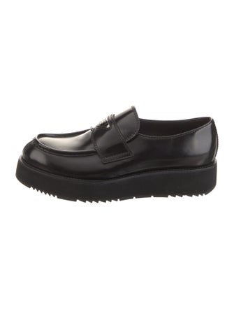 Prada Enameled Metal Triangle Patent Leather Loafers