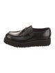 Prada Enameled Metal Triangle Patent Leather Loafers