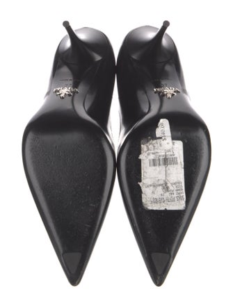 Prada Enameled Metal Triangle Patent Leather Pumps