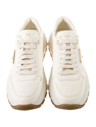 Prada Enameled Metal Triangle Leather Sneakers