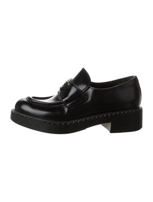Prada Enameled Metal Triangle Patent Leather Loafers