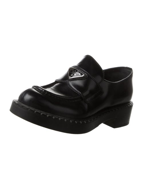 Prada Enameled Metal Triangle Patent Leather Loafers