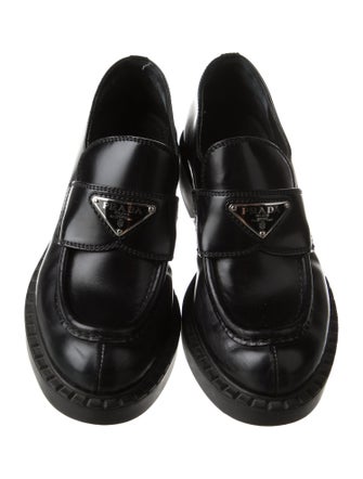 Prada Enameled Metal Triangle Patent Leather Loafers