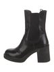 Prada Enameled Metal Triangle Leather Chelsea Boots