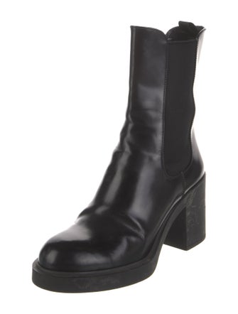 Prada Enameled Metal Triangle Leather Chelsea Boots