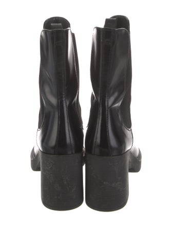 Prada Enameled Metal Triangle Leather Chelsea Boots