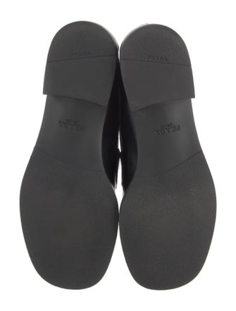 Prada Enameled Metal Triangle Leather Loafers