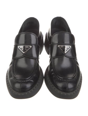 Prada Enameled Metal Triangle Leather Pumps