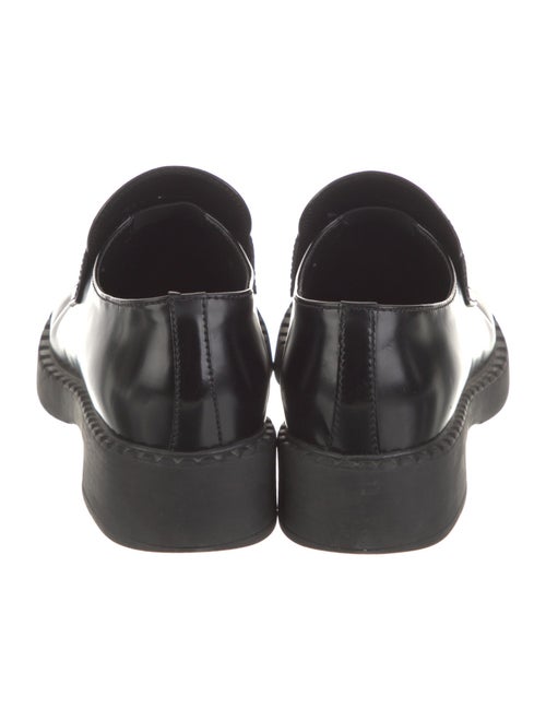 Prada Enameled Metal Triangle Leather Pumps