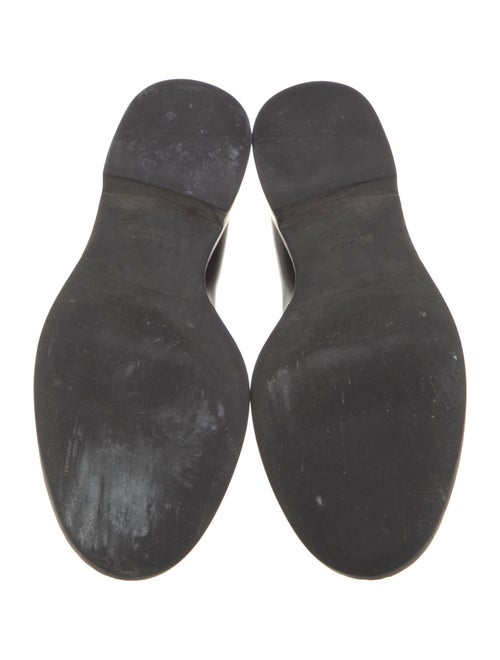 Prada Enameled Metal Triangle Leather Pumps