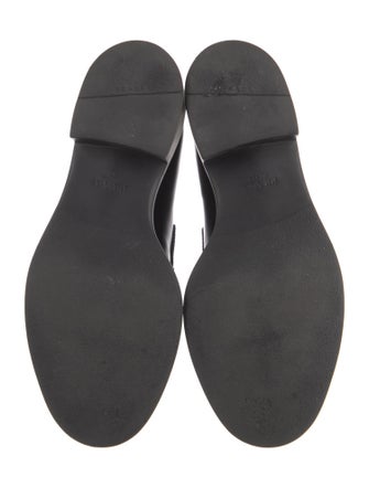 Prada Enameled Metal Triangle Leather Loafers