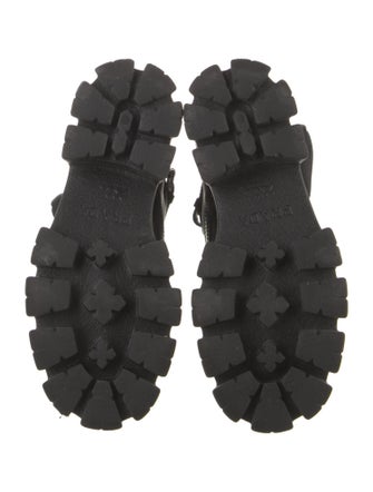 Prada Enameled Metal Triangle Leather Combat Boots